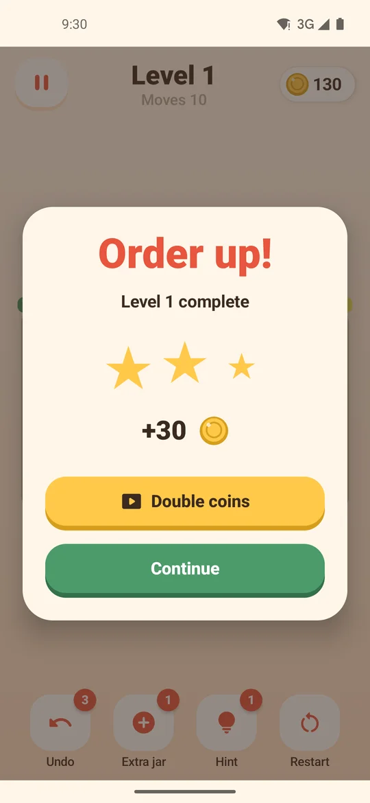 Actual game completion screen showing earned stars and coins.